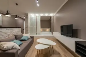 A bright living room with a sofa, representing the interior design topics on the blog
